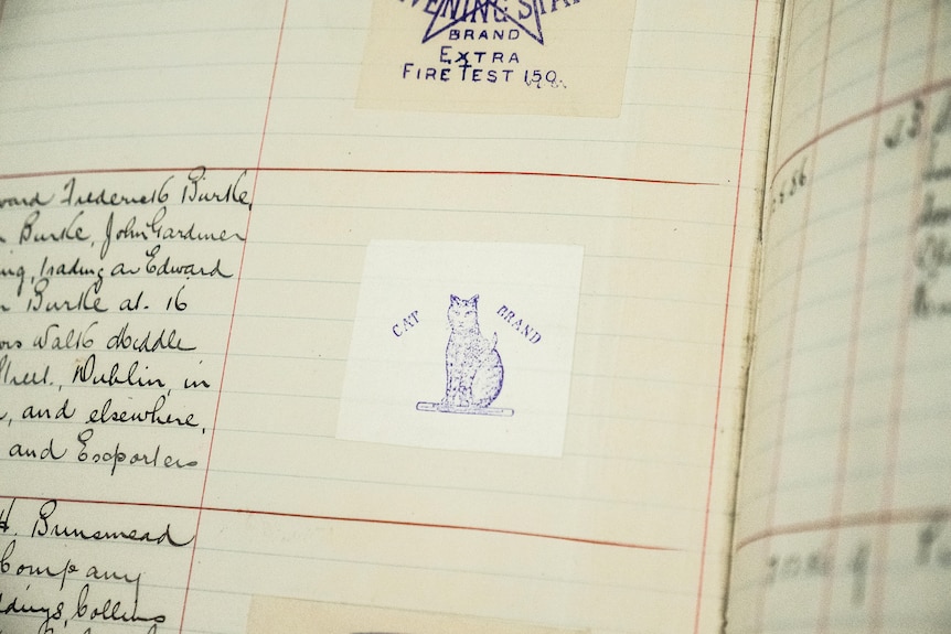 A picture and handwritten entry in a ledger