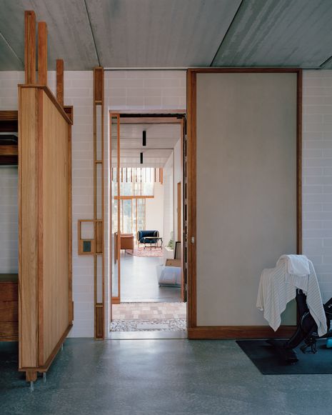 Sliding panels and apertures choreograph the movement of people, light and air throughout Birdwood.