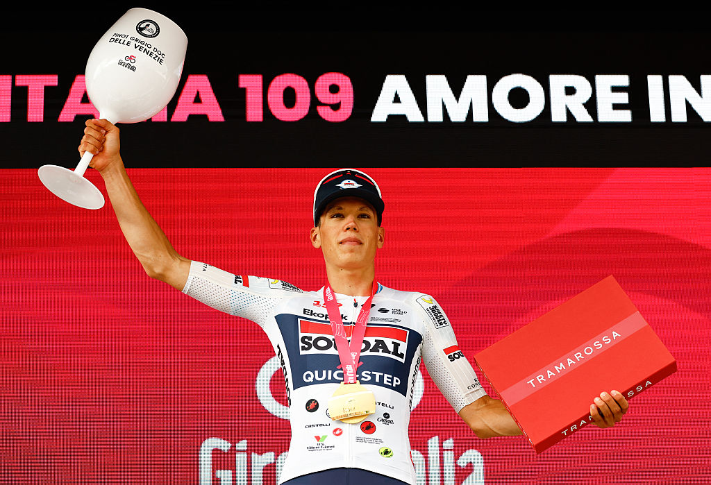 Soudal Quick-Step French rider Paul Magnier celebrates on the podium after winning the 3nd stage of the Giro d'Italia 2026 - Tour of Italy cycling race between Plovdiv and Sofia, Bulgaria, on May 10, 2026. (Photo by Luca Bettini / AFP)