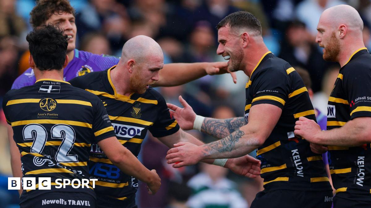 Max Bodilly celebrates scoring a try for Cornwall