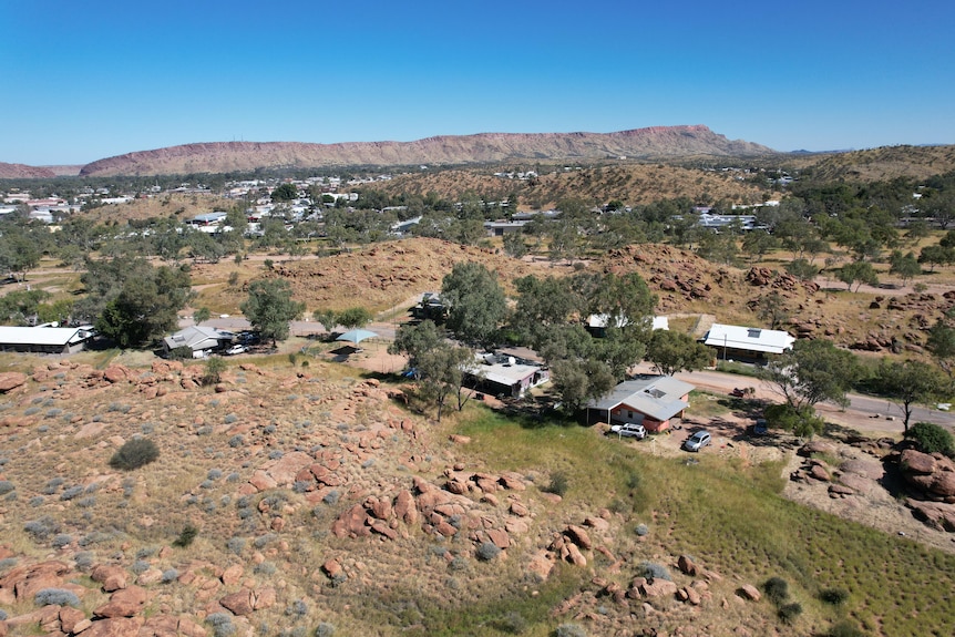 A group of small, squat buildings sits outside Alice Springs.