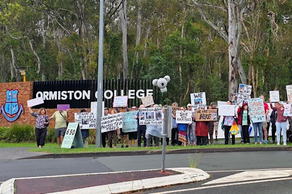 Protesters outside the college this week.