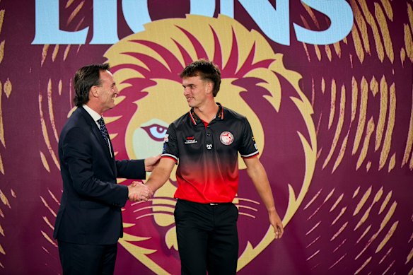 Brisbane Lions academy player Daniel Annable at last year’s draft, with AFL boss Andrew Dillon.