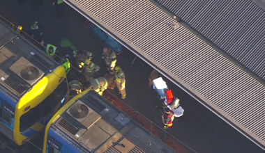 Schoolboy in critical condition after becoming trapped under train at North Melbourne Station