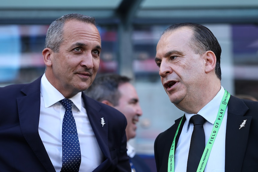 Andrew Abdo and Peter V'landys speak to each other