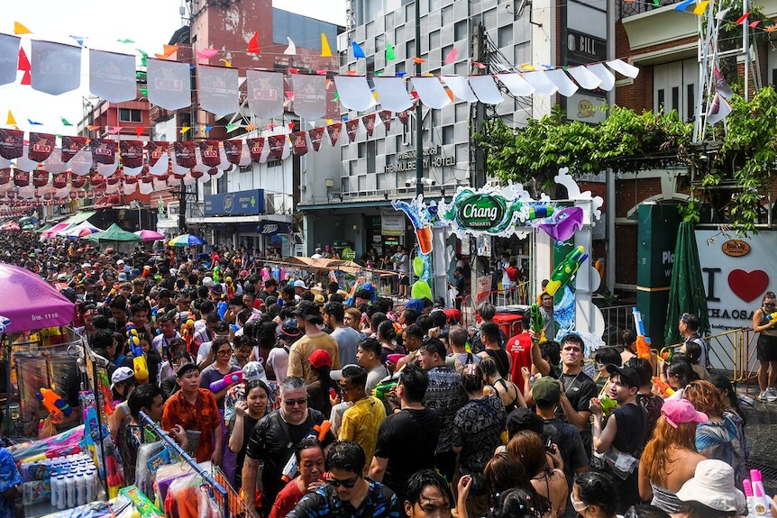 A crowd of tourists and locals in Bangkok, Thailand