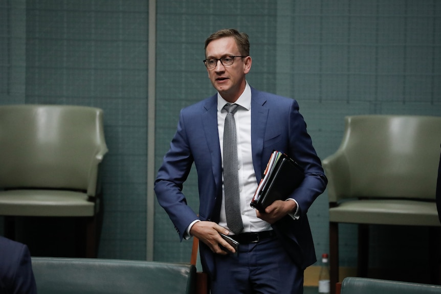A man in a suit in Parliament House