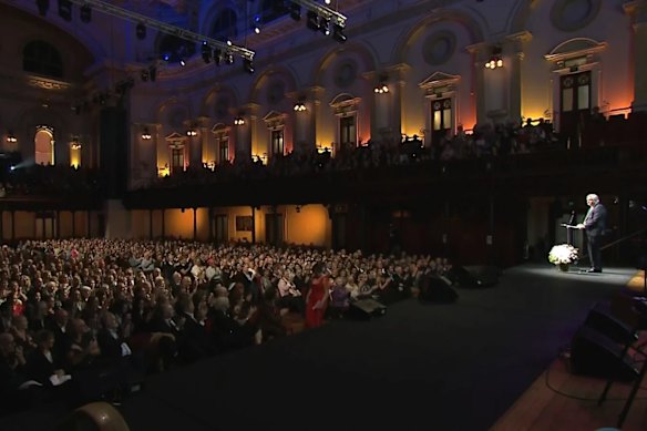 Richard Glover as master of ceremonies at the packed Sydney Town Hall.