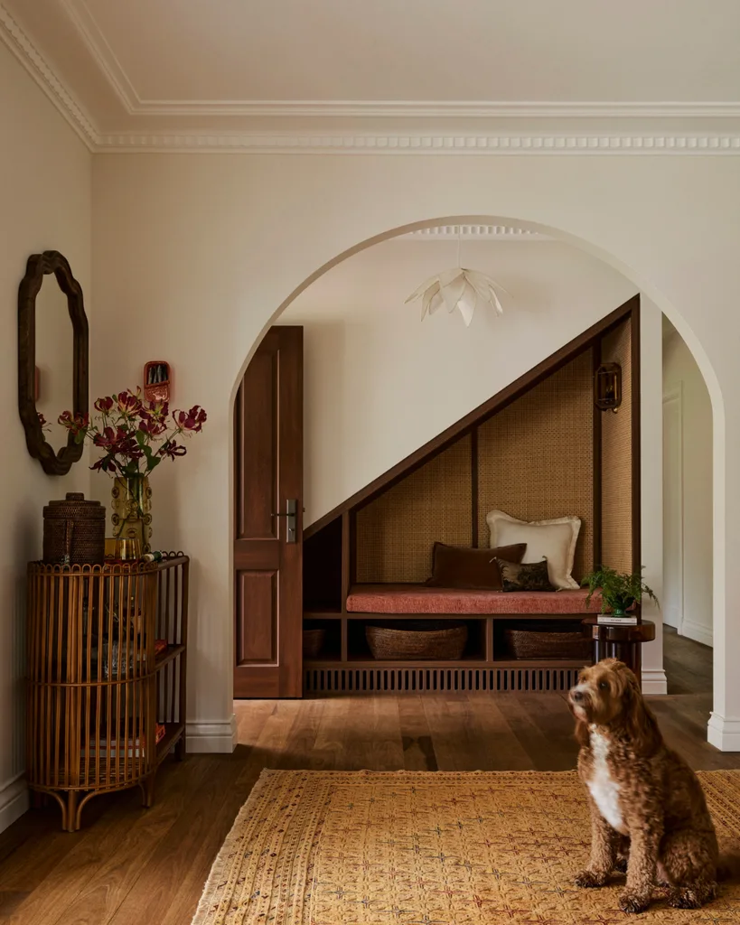 Mid-century coastal entryway with dog