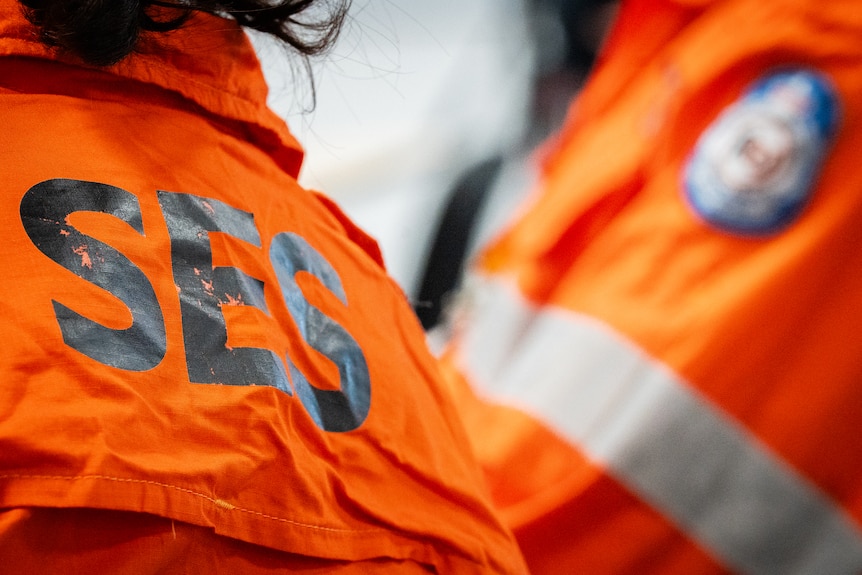 NTES (NT Emergency Service) and SES logo on uniform.