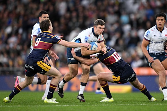 Lawson Creighton takes on the Highlanders defence in Dunedin