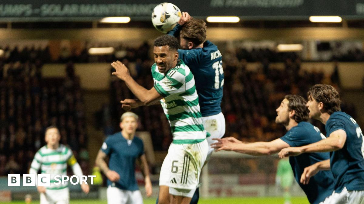 Motherwell's Sam Nicholson jumps with Celtic's Aaron Trusty