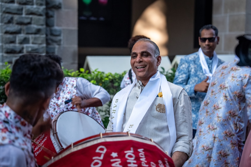 A man playing a drum.