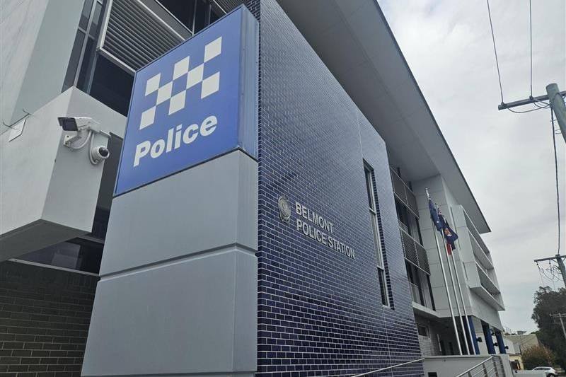 Outside tiled blue police station