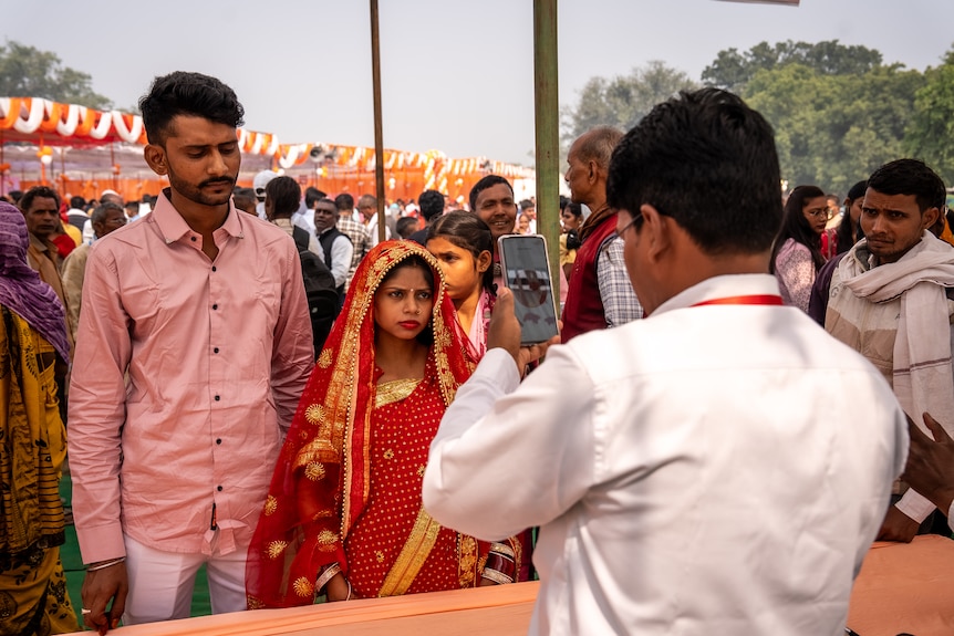 Two people having their photo taken.