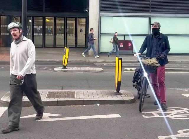 Benedict Cumberbatch in an altercation with a masked cyclist on St Pancras road in London on May 5Credit: SWNS