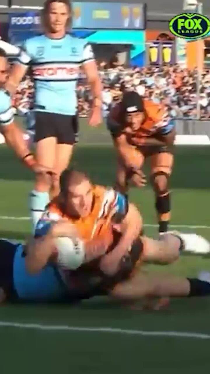 Tigers star’s shoulder pops out while scoring a try