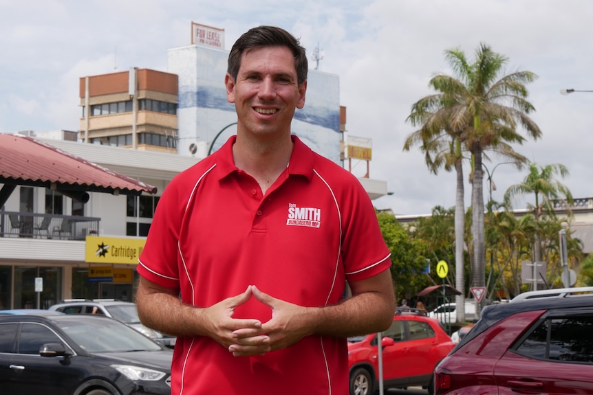Tom Smith wears a red Labor shirt.
