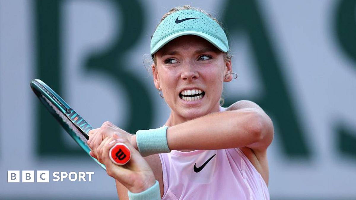 Katie Boulter, wearing a lilac sleeveless top and mint visor, grimaces as she plays a backhand, with her racquet held in two hands over her right shoulder