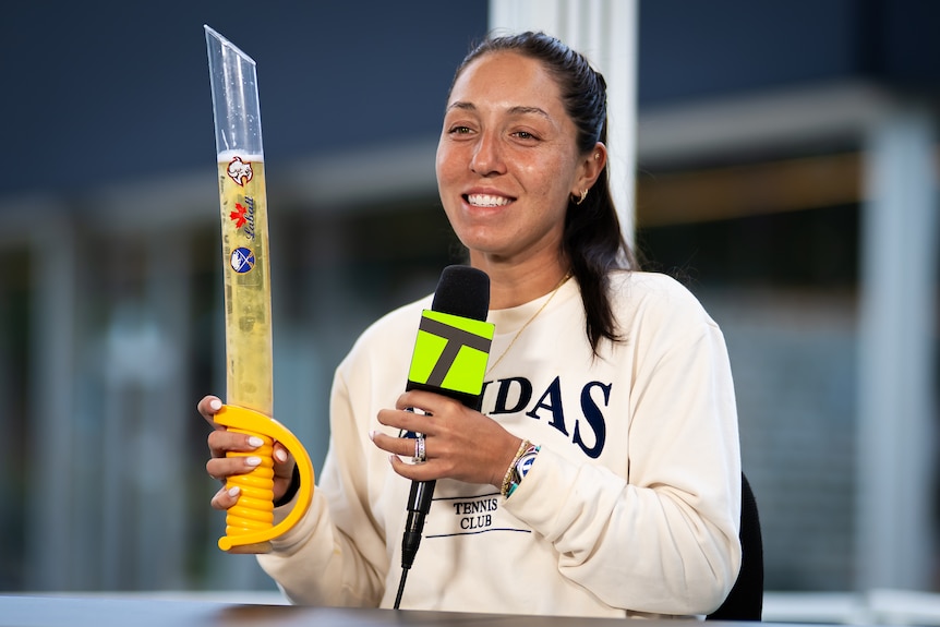 Jessica Pegula holds a Sabers drink