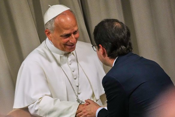 Pope Leo XIV greets Anthropic co-founder Christopher Olah at the Vatican on Monday.