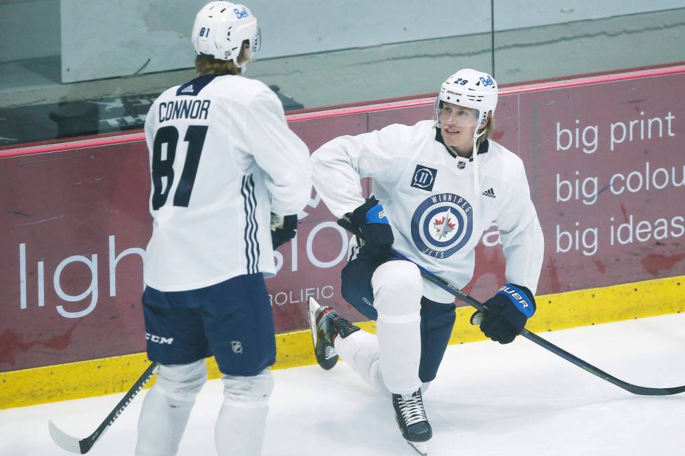 JOHN WOODS / THE CANADIAN PRESS FILES
Former Winnipeg Jets forward Patrik Laine (right) posted his career highs with the club.