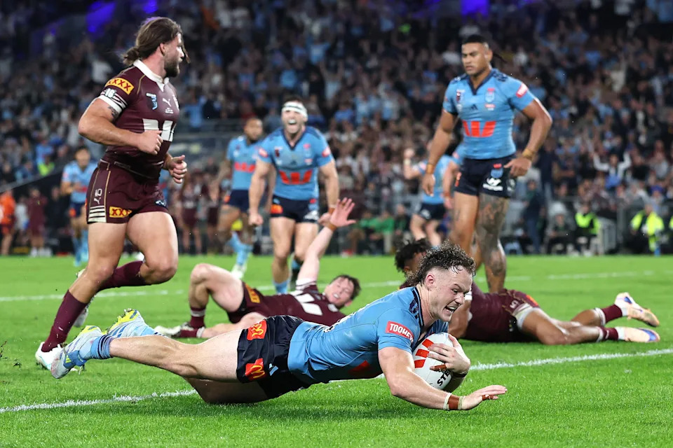 Seen here, Ethan Strange scoring a crucial try for the Blues in their Origin Game 1 win.