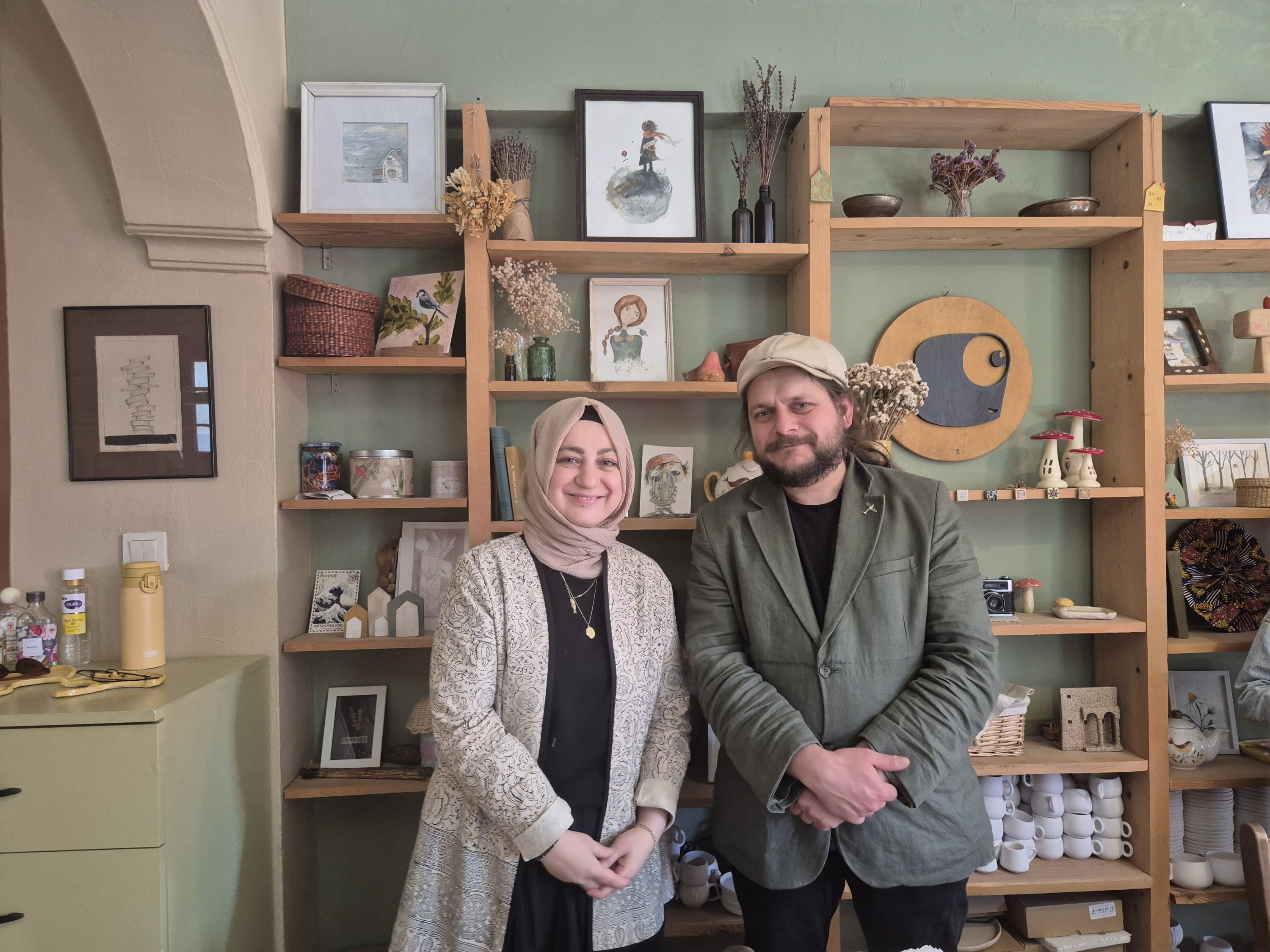 Sümeyra Demir (L) and Ahmet Demir pose together at Atölye Balık, Istanbul, Türkiye, April 27, 2026. (Photo by Ayşe Sena Aykın)