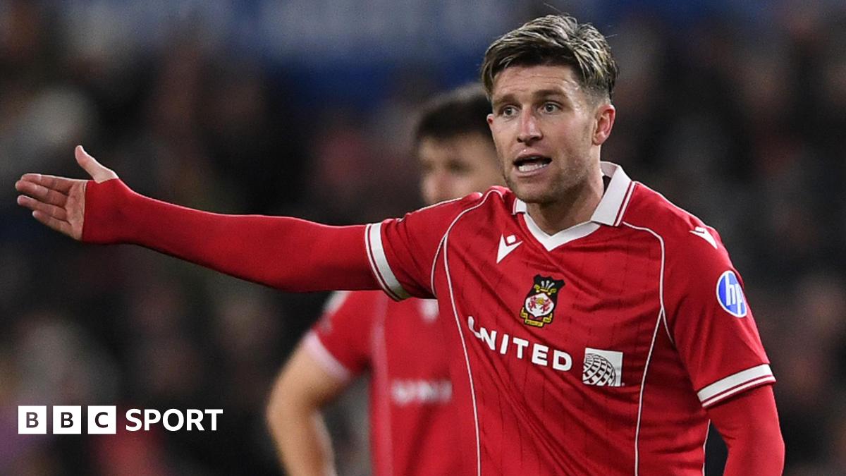 Josh Windass holds out his arm