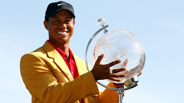 Tiger Woods of the USA poses with the trophy after the final round of the 2009 Australian Masters at Kingston Heath Golf Club on November 15, 2009 in Melbourne, Australia. (Photo by Quinn Rooney/Getty Images)