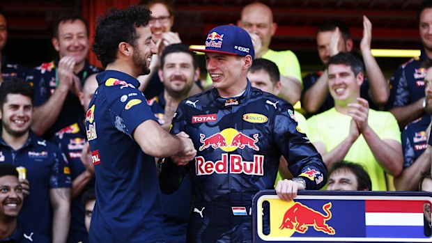 Circuit de Catalunya, Barcelona, Spain. Sunday 15 May 2016. Daniel Ricciardo, Red Bull Racing, congratulates Max Verstappen, Red Bull Racing, 1st Position, on his first and record breaking F1 win. (Photo by Andy Hone/LAT Images)