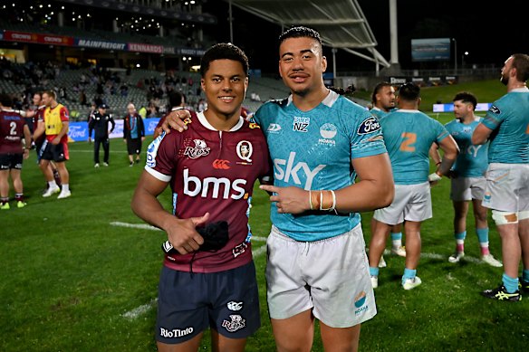 Treyvon Pritchard of the Reds and Israel Leota of Moana Pasifika.