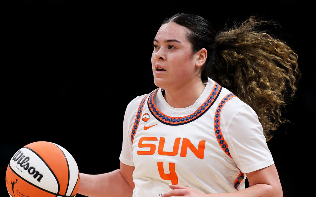 Charlisse Leger-Walker drives the ball in her first WNBA match for the Connecticut Sun against the New York Liberty, Brookln, New York, May 08, 2026. (Photo by Ishika Samant / GETTY IMAGES NORTH AMERICA / Getty Images via AFP)