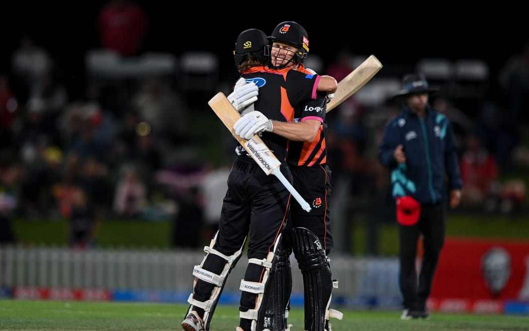 Ben Pomare and Scott Kuggeleijn celebrate the Northern Brave Super Smash Grand Final win, 2026.