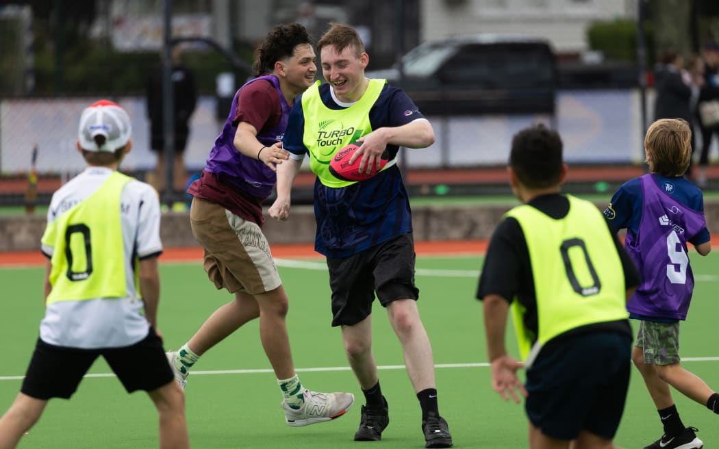 Touch rugby players in action.