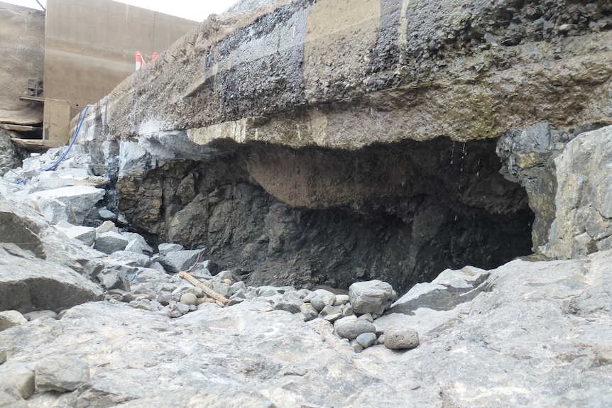 close up shot of a scoured concrete dam wall