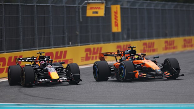 Oscar Piastri of Australia driving the (81) McLaren MCL40 Mercedes overtakes Max Verstappen of the Netherlands driving the (3) Oracle Red Bull Racing RB22 Red Bull Ford on track during the F1 Grand Prix of Miami at Miami International Autodrome on May 03, 2026 in Miami, Florida. (Photo by Andy Hone/LAT Images)