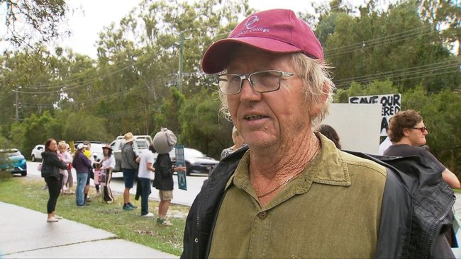 Ian Mazlin, whose son attended the college, is protesting the development.