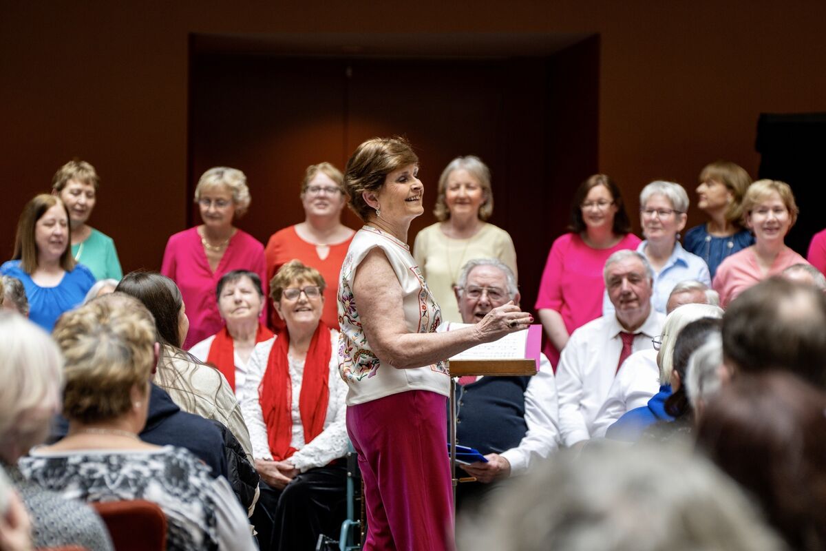 Bernadette Kiely leads the Stroke Notes choir performing at the Clayton Hotel, Cork city, as part of the Cork International Choral Festival. Picture: Chani Anderson
                    