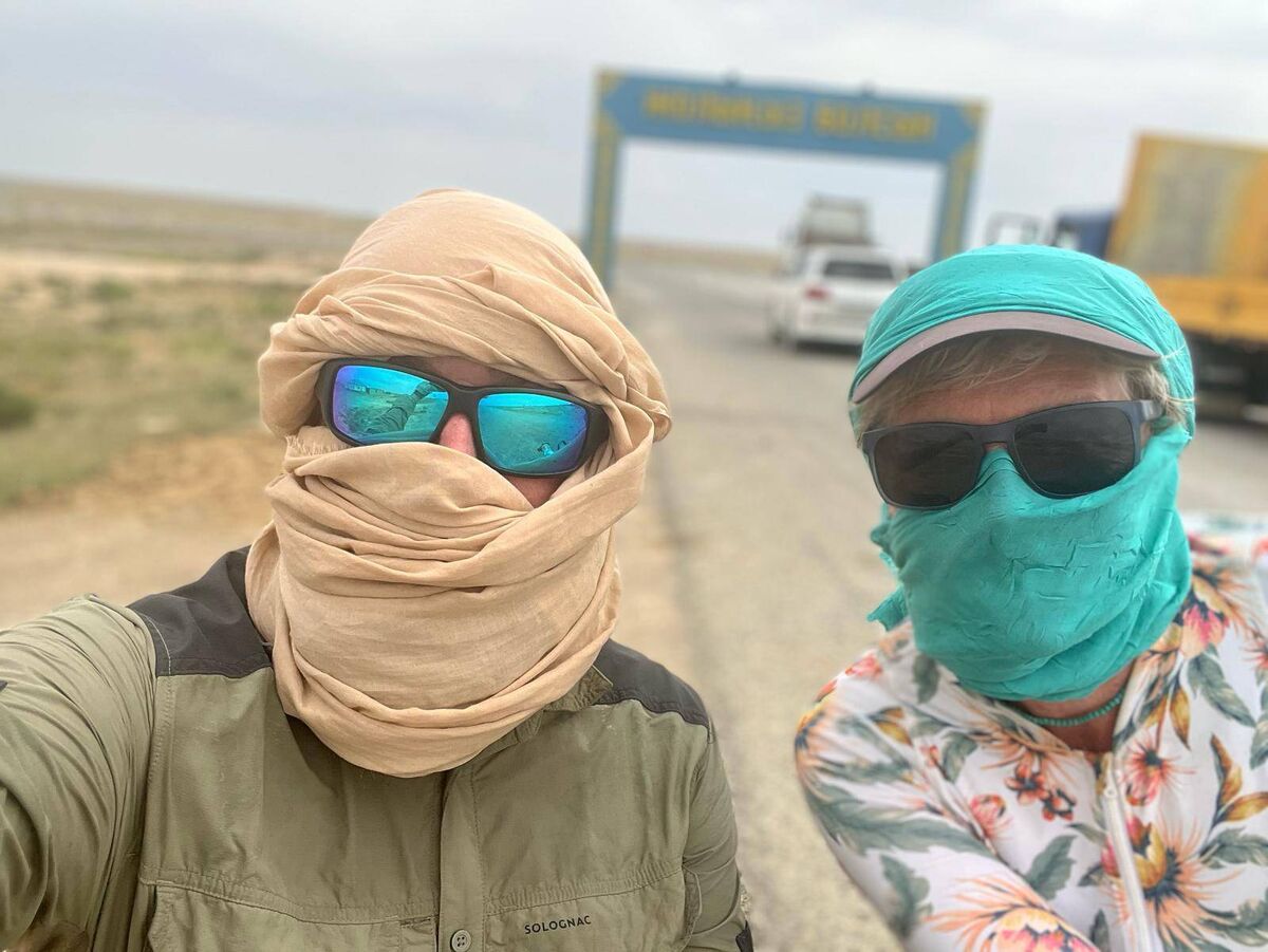 Mark and Ellie wearing head covers in Kazakhstan.