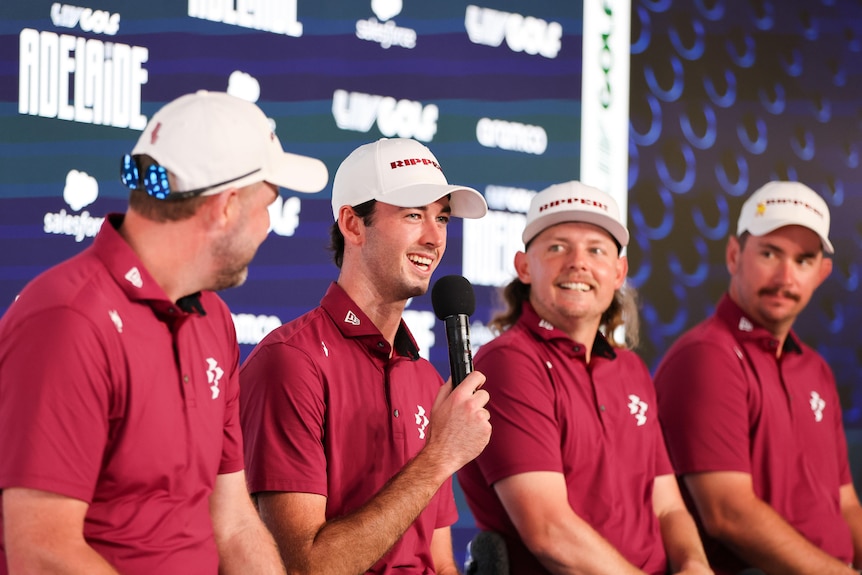 Four Australian LIV Golf teammates smile at a press conference in Adelaide.