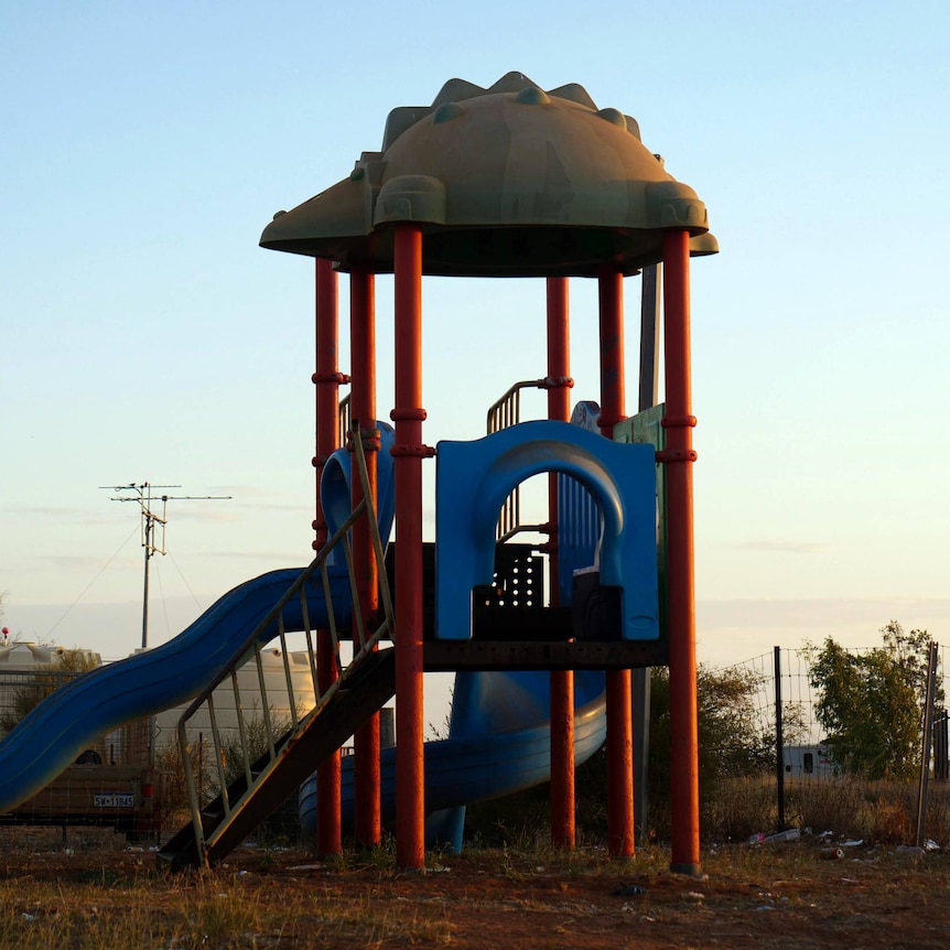 A playground in the setting sun.