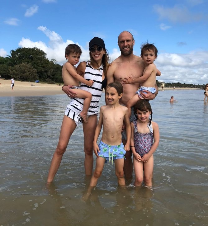 Bec and Chris Judd with their kids.