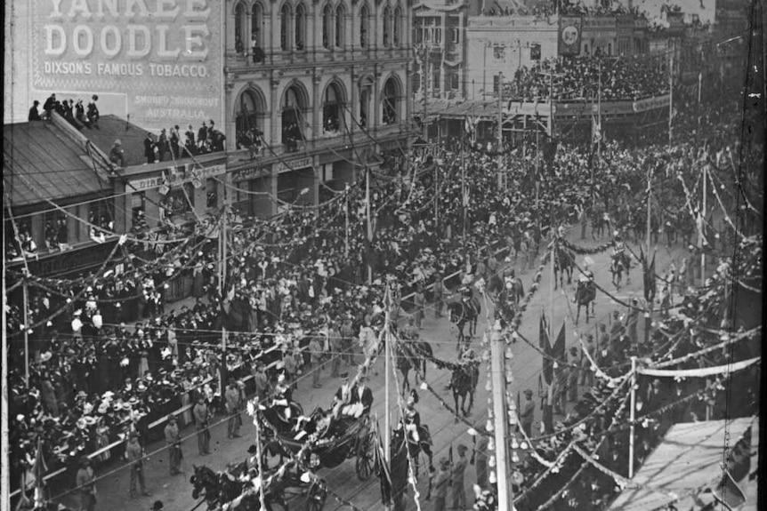 An old photo of a procession.