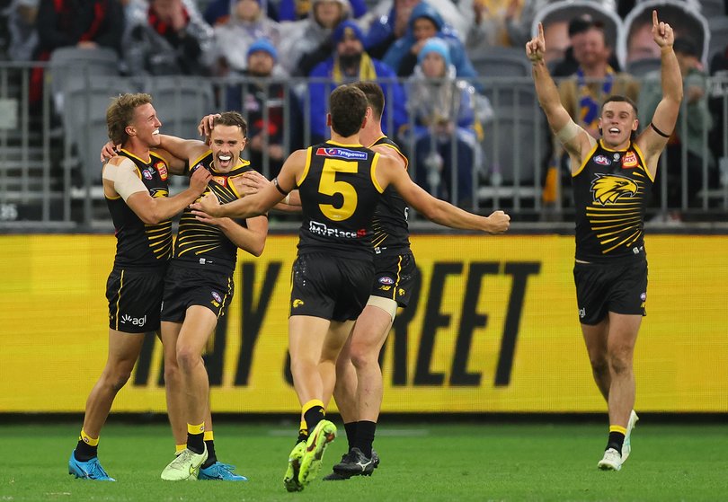 PERTH, AUSTRALIA - MAY 31: Tom McCarthy of the Eagles is congratulated by team mates after kicking a goal during the round 12 AFL match between West Coast Eagles and Essendon Bombers at Optus Stadium, on May 31, 2026, in Perth, Australia. (Photo by Paul Kane/Getty Images via AFL Photos)