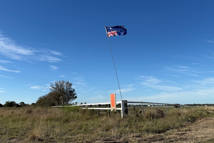 upside down flag in paddock