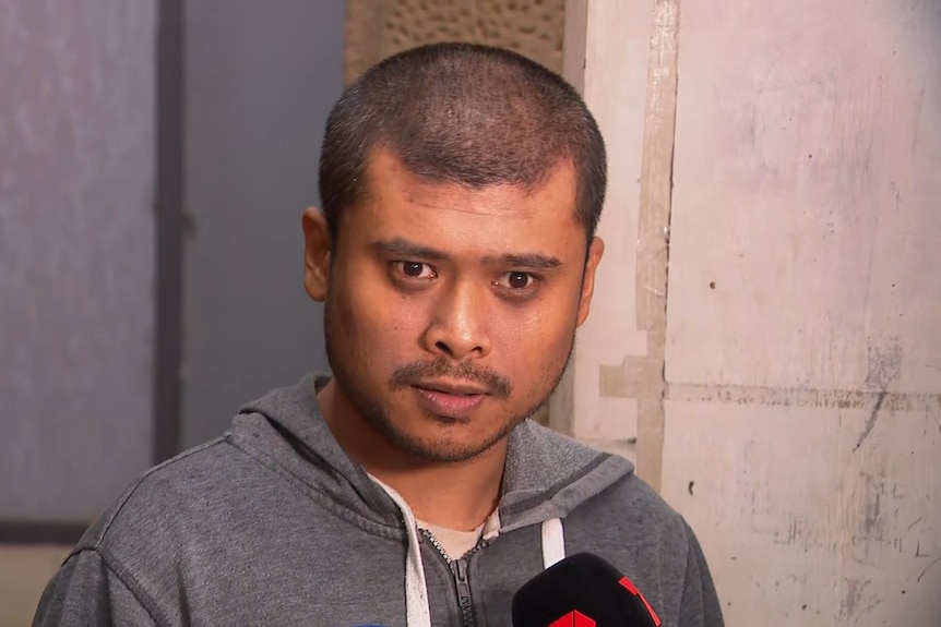 Jonathon Dalangin a friend of the feng family speaks outside campbelltown court