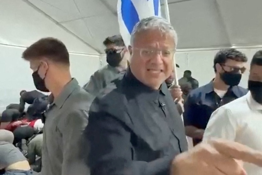 Ben-Gvir looks furious as he points at prisoners during a visit.