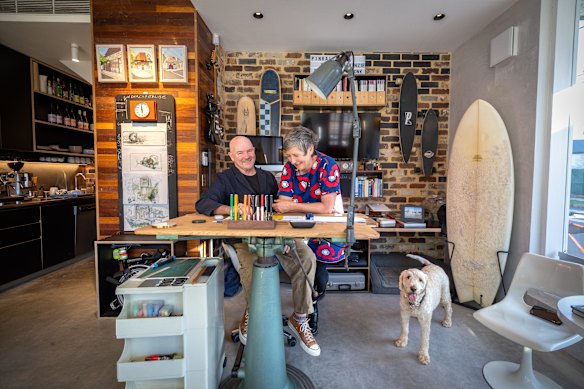 Architects Neil Mackenzie and Heidi Pronk and their groodle Milo inside the Marrickville corner terrace that they renovated with Make Projects. The group created Crossroads, a studio, an apartment and a new home that has been shortlisted for an award.