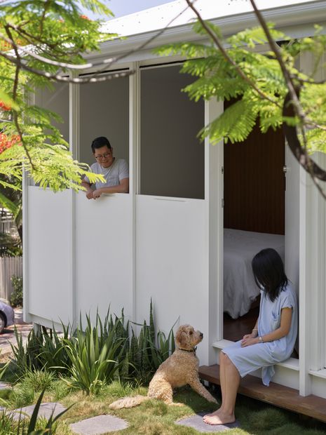 At Three House (2020), panels slide vertically to connect bedrooms directly to the garden.